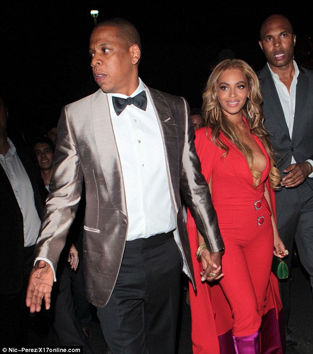 Heading out: Showing off their prize-fight best, the married couple left the fight for their after-party