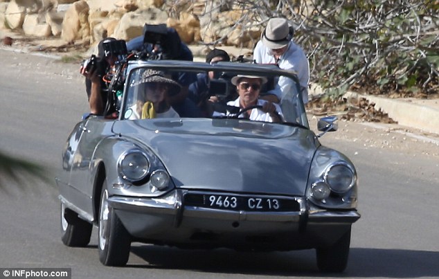 Two (or more) for the road: By The Sea is the first time Jolie and Pitt have co-starred in a movie since 2005's Mr & Mrs Smith; here they are seen filming in Malta in November