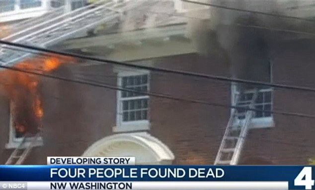Flames and smoke were seen billowing out of the upstairs window at the home before the bodies were found