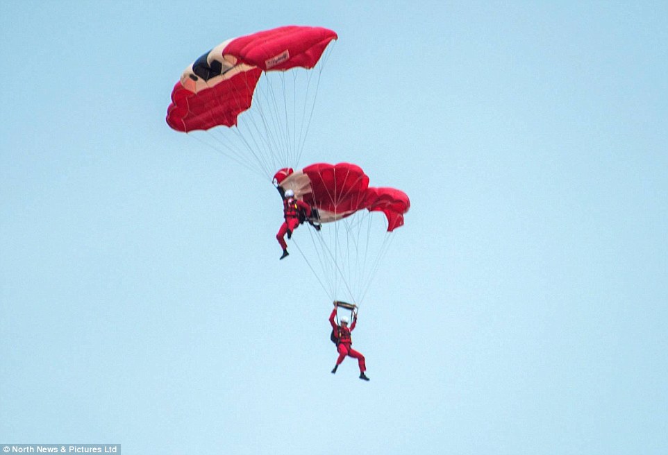 Sgt Baz Loftus, the safety operations manager on the ground for the Red Devils, refused to identify the two parachutists involved