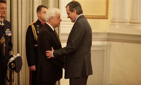 Η συνάντηση και ο ρόλος του Καραμανλή