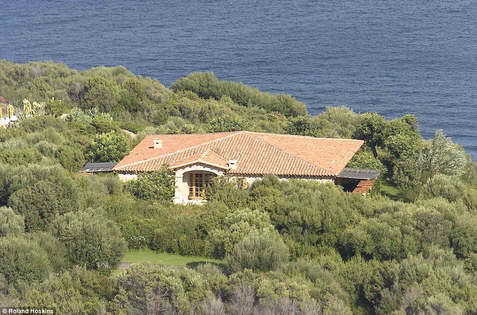 The estate is made up of a number of rooms and comes with its own separate villa (pictured) which overlooks the Mediterranean