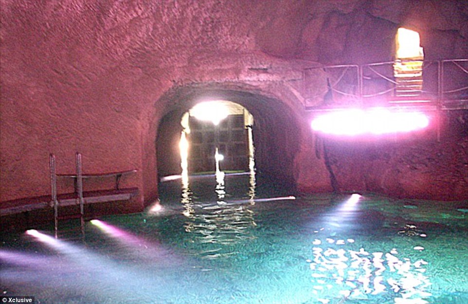 The flamboyant retreat has been known about since 2004 when opposition politicians objected to a series of changes at the property. In 2012, photographs emerged of an underwater chamber at the villa (pictured), which allows guests to secretly pass in and out of the villa