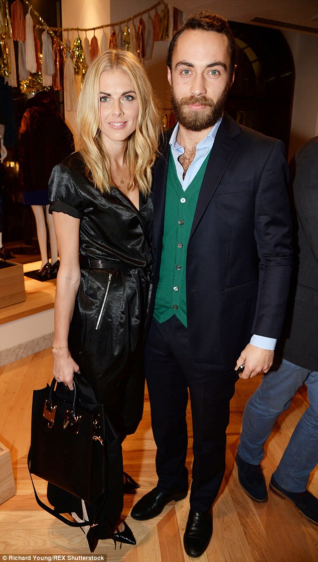 In happier times: Donna, pictured with Kate Middleton's brother in November 2013, is said to be 'heartbroken' after James unexpectedly ended things