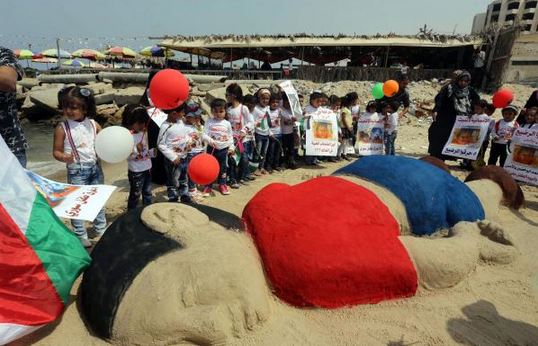 Τεράστιο γλυπτό του μικρού Αϊλάν από άμμο σε παραλία της Γάζας – ΦΩΤΟ
