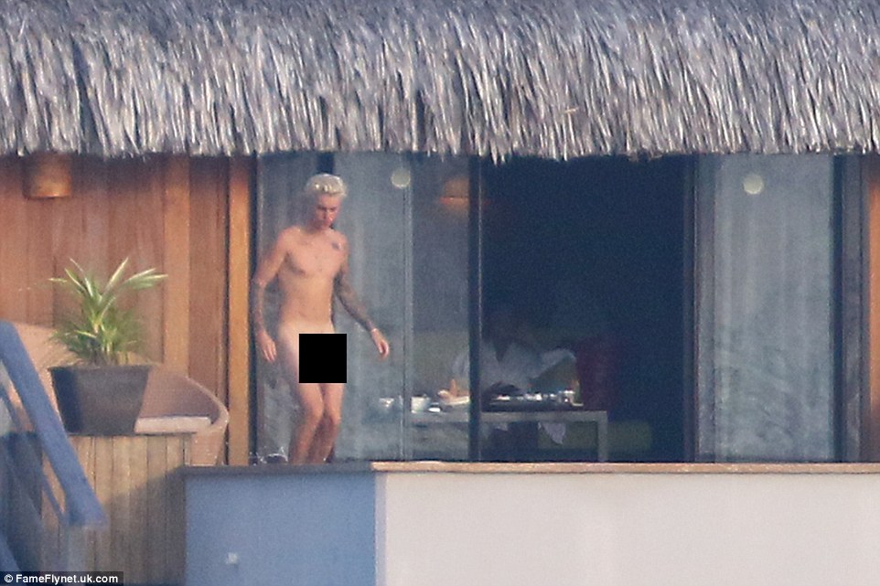 Can you Belieb it? The pop sensation cut a relaxed figure as he kicked back and went full frontal
