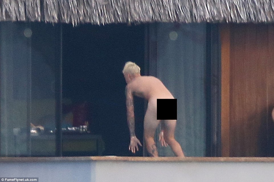 Been here before: Back in July he delighted his Beliebers when he shared a naked photo on his Instagram account, standing with his back to the camera on the edge of a boat