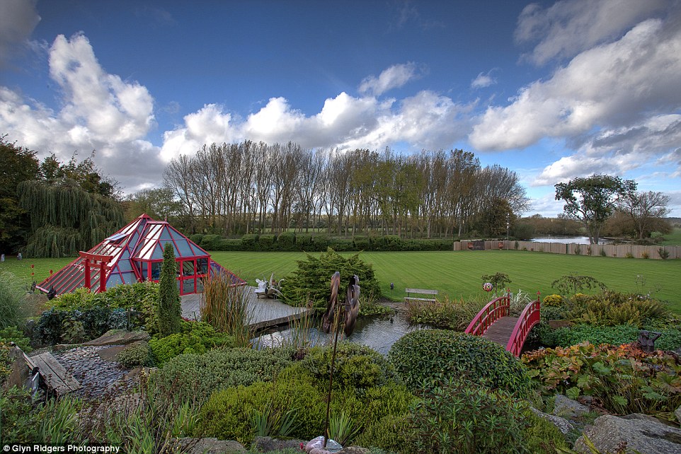 In the garden is a red pyramid. Three times a year Geller flies in terminally ill children and tries to inspire them to think positively inside the glazed walls of the unique structure