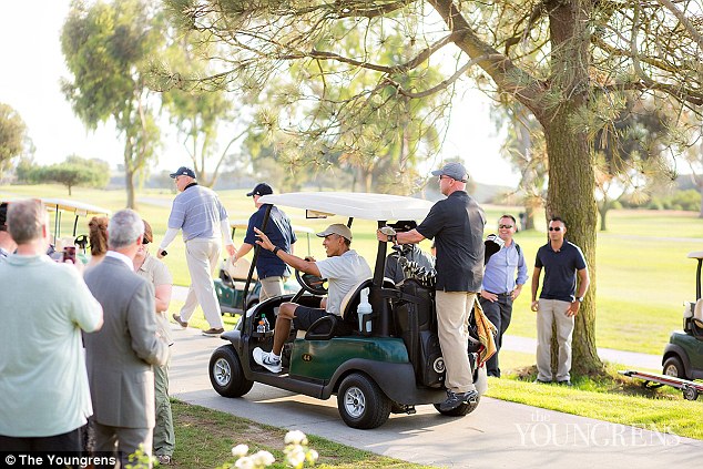The President waved at the crowds from his golf buggy after finishing his game and joining the wedding party