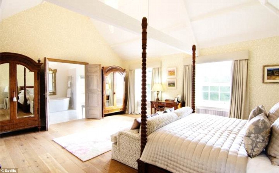 Master suite: The main bedroom adjoins a luxury bathroom and has views over the 22-acre estate out of the double windows