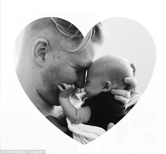 Celebration: Tess Holliday and her fiancé Nick Holliday welcomed fiancé their first child together — a baby boy named Bowie Juniper — on Monday. Nick is pictured with their newborn son 