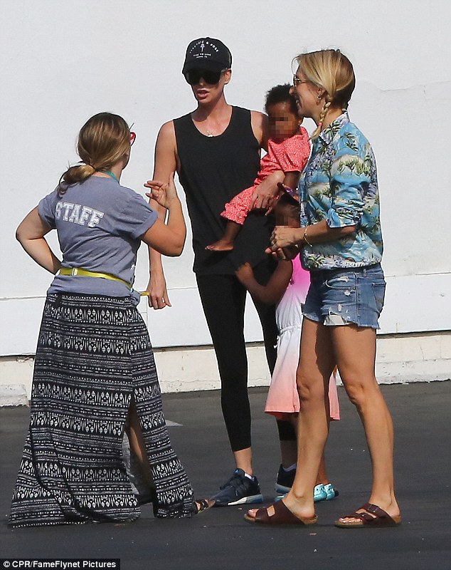 Mommy and me day: Charlize Theron treated her daughter August to a play day at a children's gym in Beverly Hills, CA on Tuesday