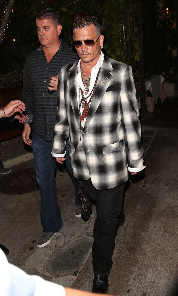 Johnny Depp steps out for a family dinner at Ago Restaurant with his daughter Lily-Rose Depp and his son John Jack Depp II