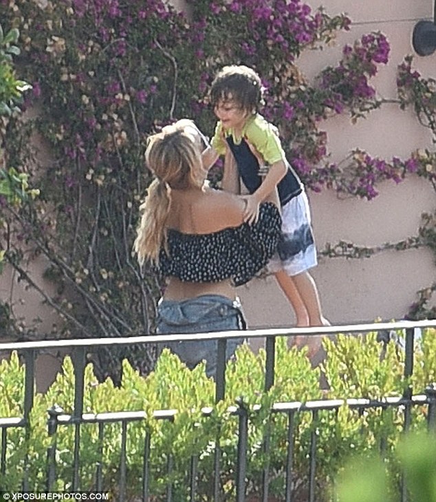 Mummy and son time: Kate Hudson proved her many roles as she spent the day larking around with her son Bingham during her Italian getaway on Thursday day