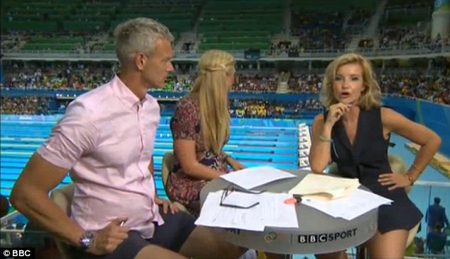 All eyes on her: The 33-year-old presenter sent Twitter into meltdown as fans rushed to comment about her tiny navy skirt that offered viewers a glimpse of her enviably long legs