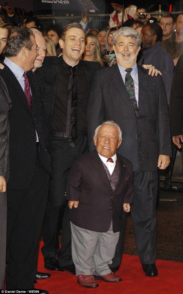 RIP: Ewan McGregor and George Lucas led the tributes to their beloved Star Wars colleague Kenny Baker who died on Saturday, aged 81 (pictured at Revenge Of The Sith premiere in London, 2005)