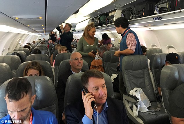 Passengers board the JetBlue Airways flight, the first regularly scheduled commercial flight between the United States and Cuba in more than half a century