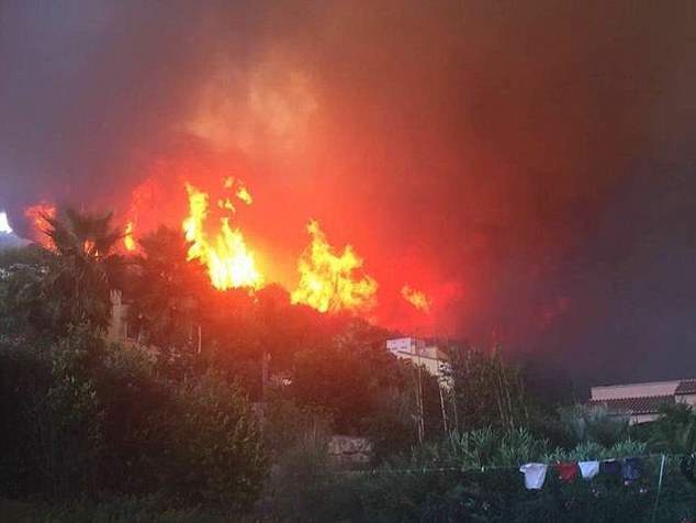 Thousands have been evacuated in Spanish towns packed with British tourists after 'horrendous' wildfires hit the Costa Blanca. Residents took to Twitter to post pictures of the blaze