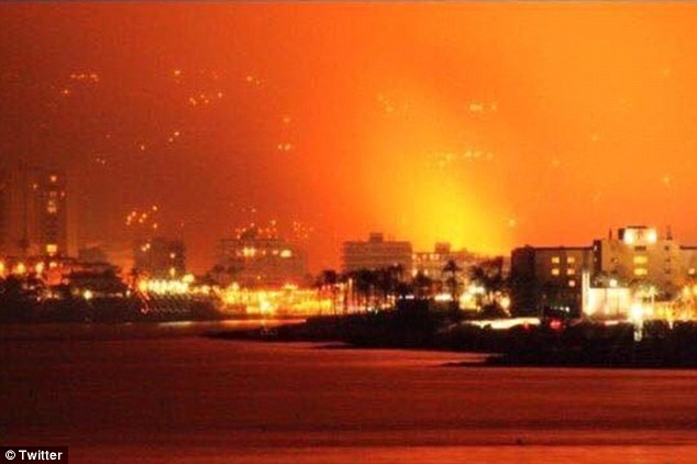 Dramatic pictures taken overnight showed the extend of the blaze in the coastal community