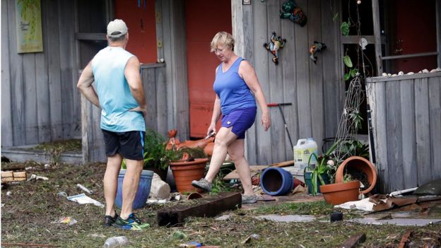 Residents check on damage after Hurricane Hermine passed through Cedar Key, Fla., Friday, Sept. 2, 2016.