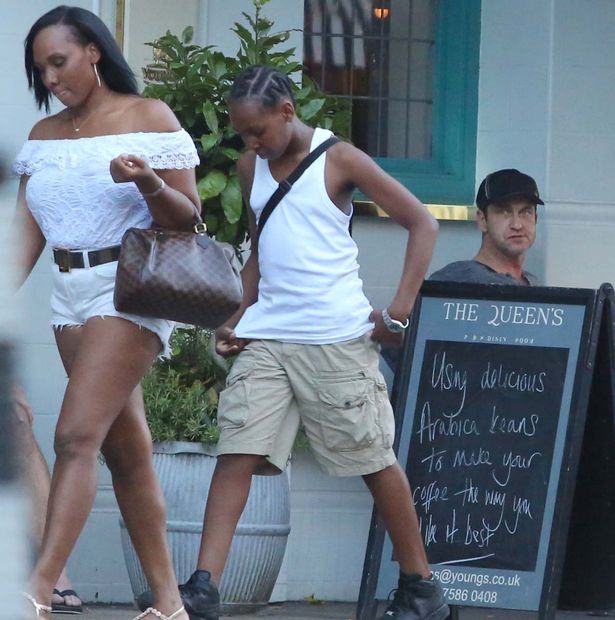 Gerald Butler is seen eyeing up every female that passes at the Queen's pub in Primrose Hill before flirting with another female and her dog inside the pub