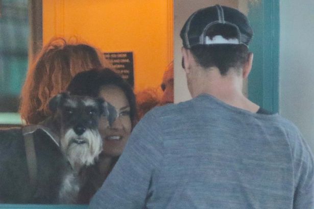 Gerald Butler is seen eyeing up every female that passes at the Queen's pub in Primrose Hill before flirting with another female and her dog inside the pub