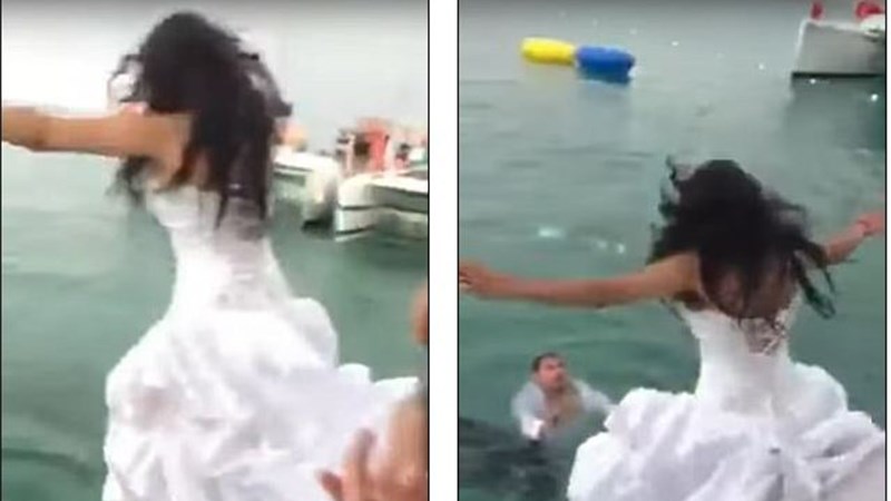 Βούτηξε με το νυφικό στη θάλασσα και κόντεψε να πνιγεί – ΒΙΝΤΕΟ