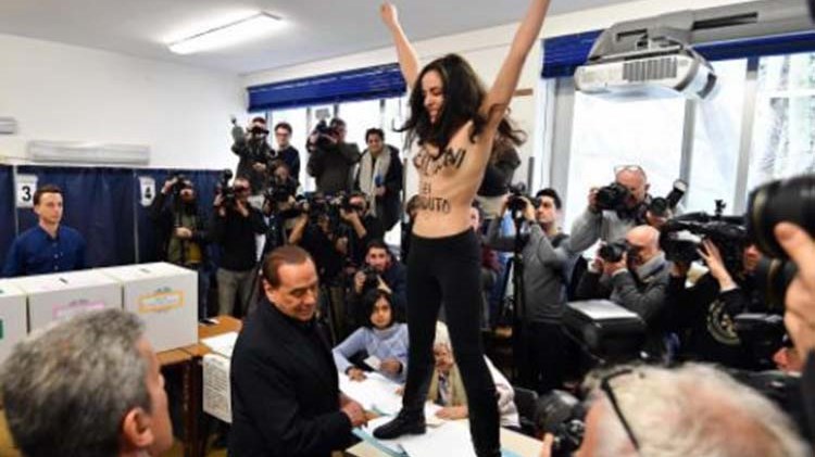 Το απρόοπτο με την γυμνόστηθη FEMEN την ώρα που ψήφιζε ο Μπερλουσκόνι – ΦΩΤΟ – ΒΙΝΤΕΟ