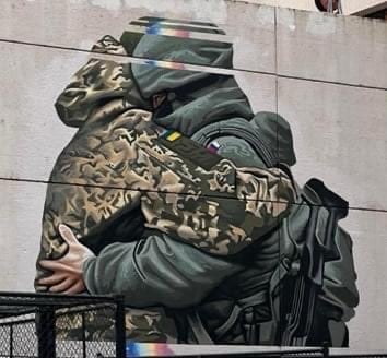 Αντιδράσεις προκάλεσε γκράφιτι στη Μελβούρνη που απεικονίζει έναν Ρώσο και έναν Ουκρανό στρατιώτη να αγκαλιάζονται