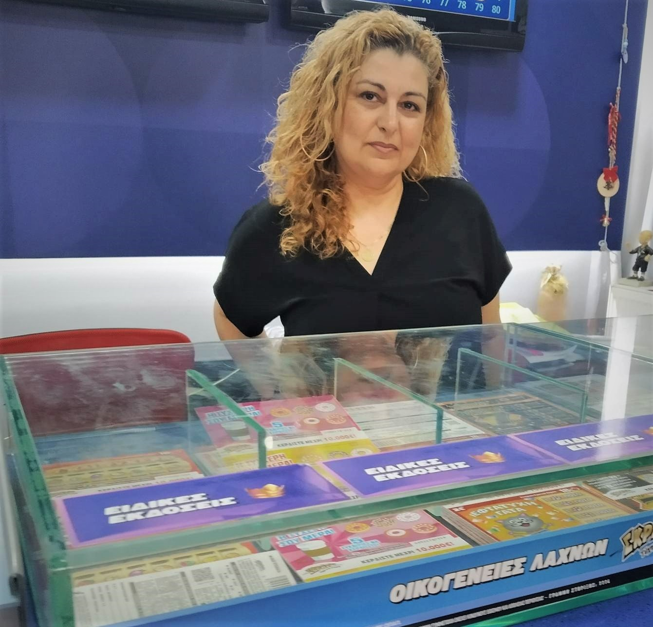 Μαρία Αντωνίου, ιδιοκτήτρια του καταστήματος ΟΠΑΠ που βρίσκεται επί της οδού Νίκου Νικολάου 11