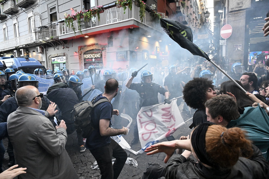Demonstrators clash with riot police officers in Naples, Italy, 08 April 2024. The demonstrators tried to cross the security cordon to get to the San Carlo Theatre, with the aim of protesting the concert scheduled for the 75th anniversary of NATO. The North Atlantic Treaty Organisation (NATO) was founded 75 years ago on 04 April 1949, and now has 32 member states.