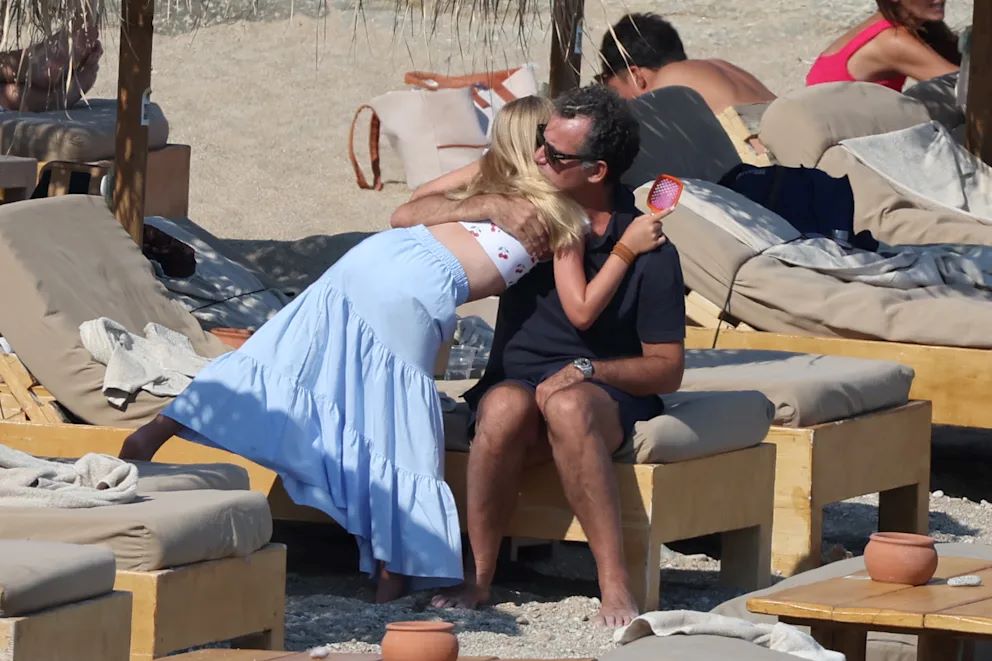 Μισέλ Χουνζίκερ