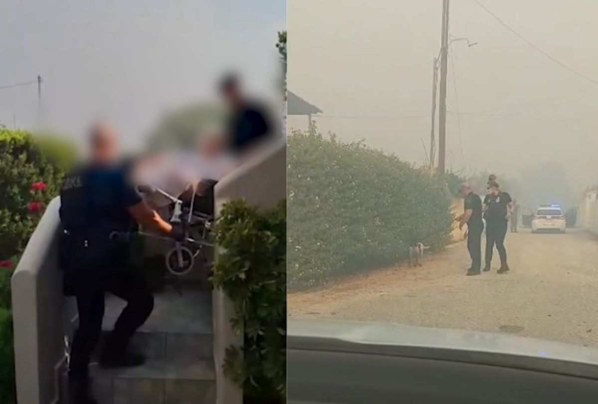 Φωτιά στην Κερατέα: Αστυνομικοί κουβάλησαν ηλικιωμένη σε αναπηρικό καροτσάκι μακριά από τις φλόγες – Απεγκλώβισαν και σκυλάκι – ΒΙΝΤΕΟ